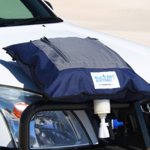 A filled water bladder on the bonnet of a 4WD